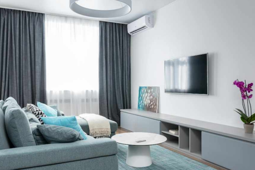 Modern living room with perfectly installed TV and DStv setup
